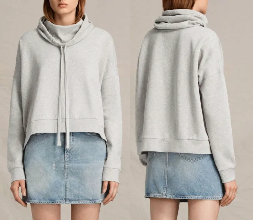Two models in grey hoodies and denim skirts